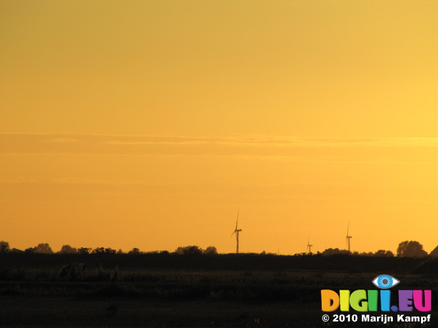 SX15052 Sunset over wind turbines